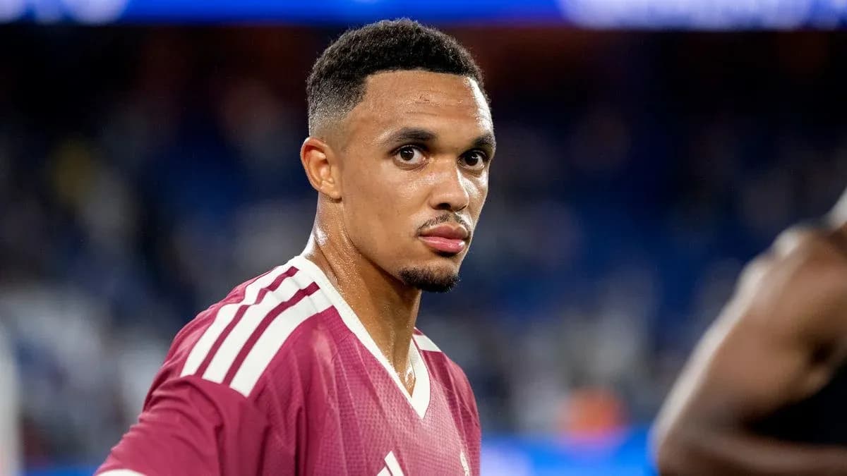 Player in maroon jersey looking at the camera Player in maroon jersey looking at the camera