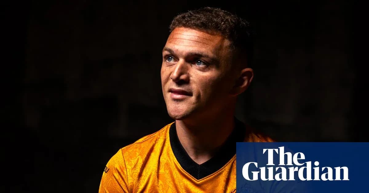 Player in orange jersey during a portrait session Player in orange jersey during a portrait session