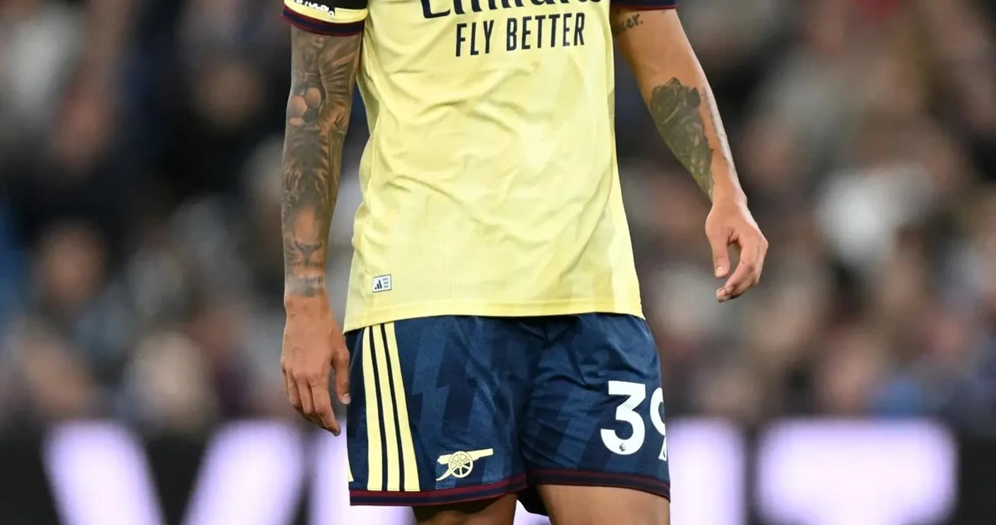 Player in Arsenal kit during match action Player in Arsenal kit during match action