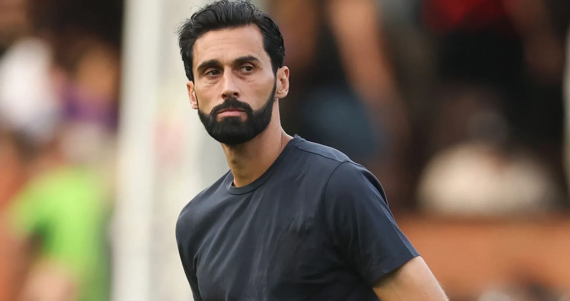 Player walking on the sidelines during a match Player walking on the sidelines during a match