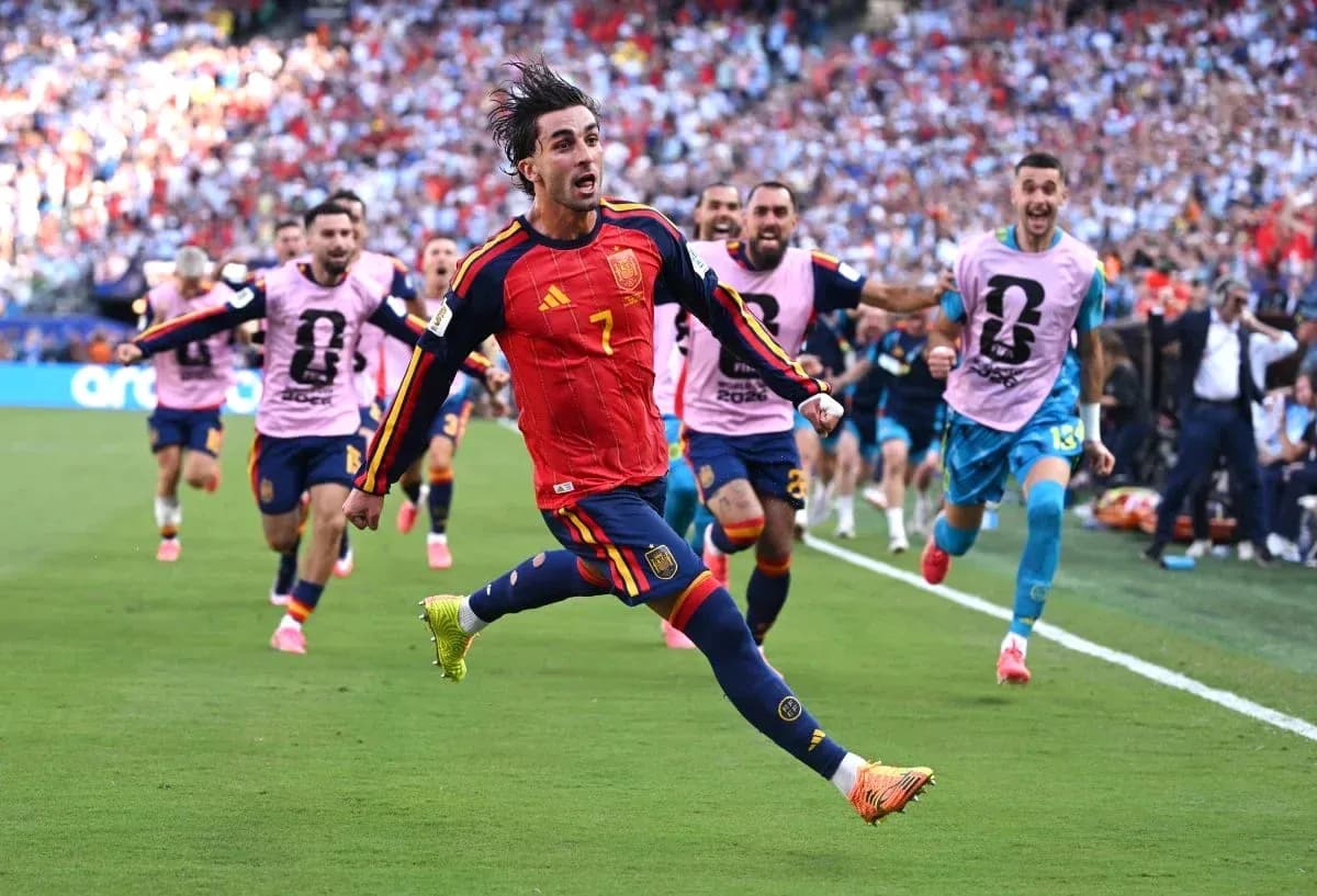 Player celebrating with teammates after scoring goal Player celebrating with teammates after scoring goal