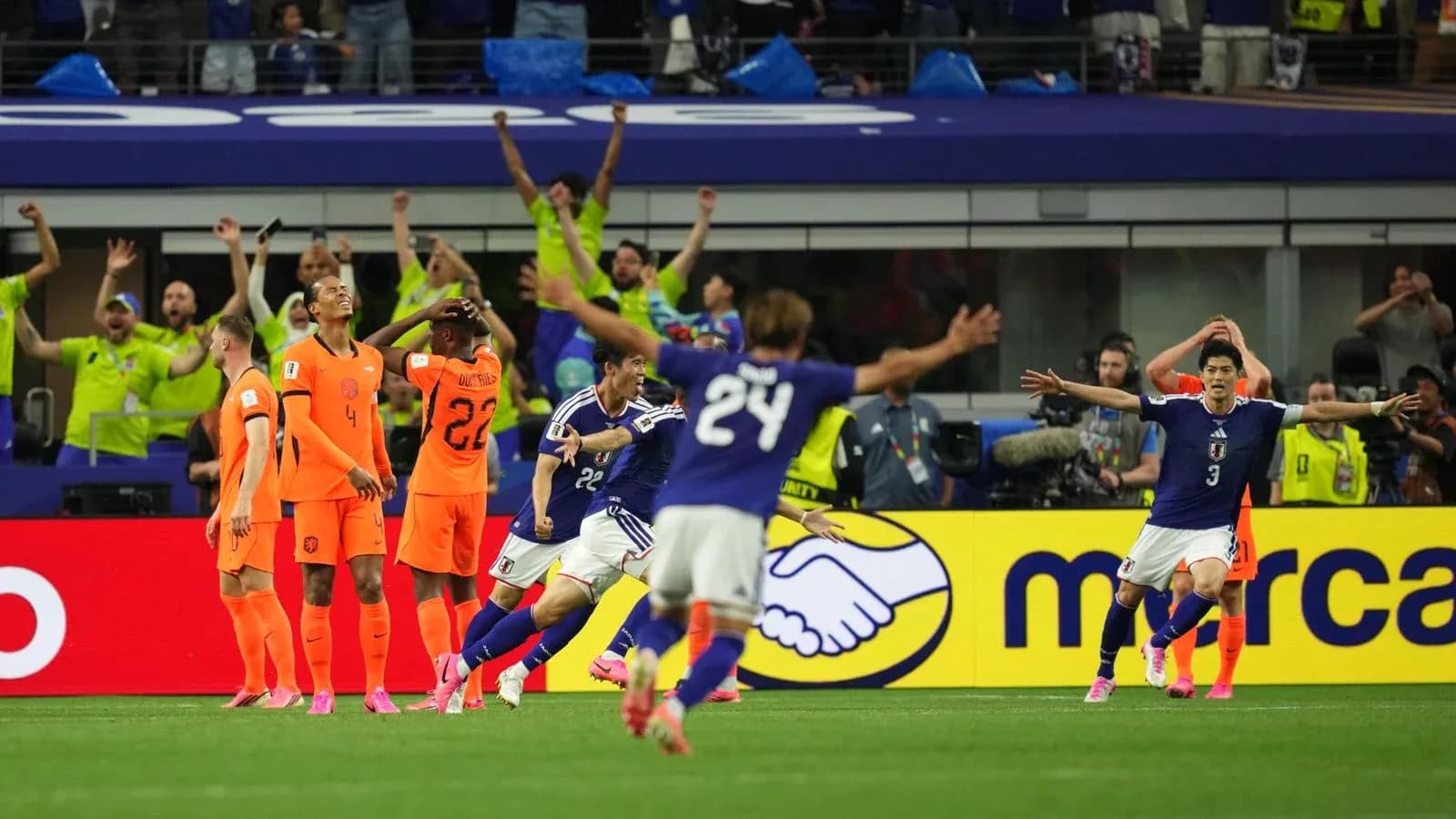 Japanese players celebrating goal against Netherlands Japanese players celebrating goal against Netherlands