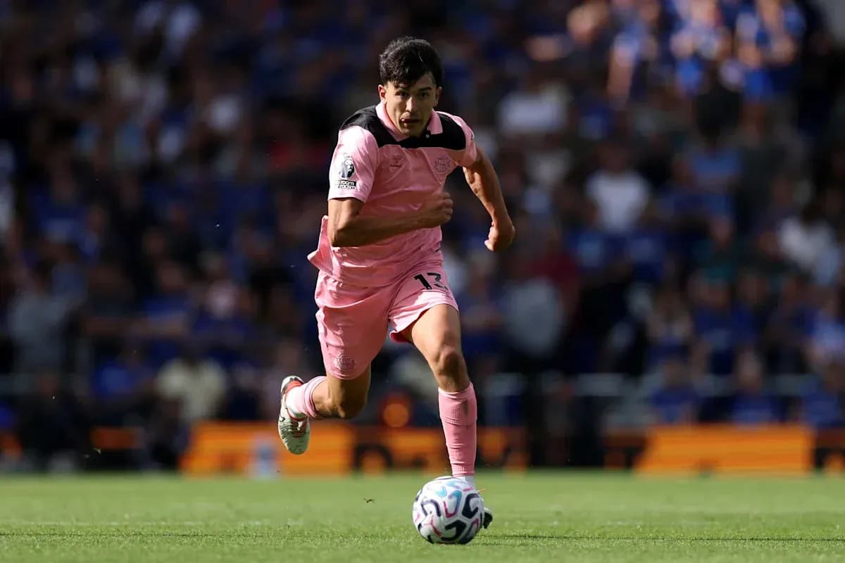 Player sprinting with ball during match Player sprinting with ball during match