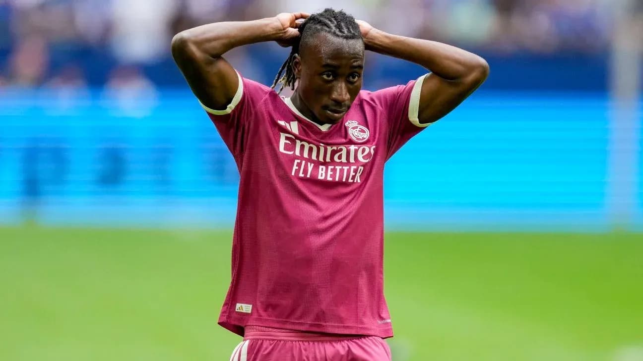 Player in pink jersey holding head during match Player in pink jersey holding head during match