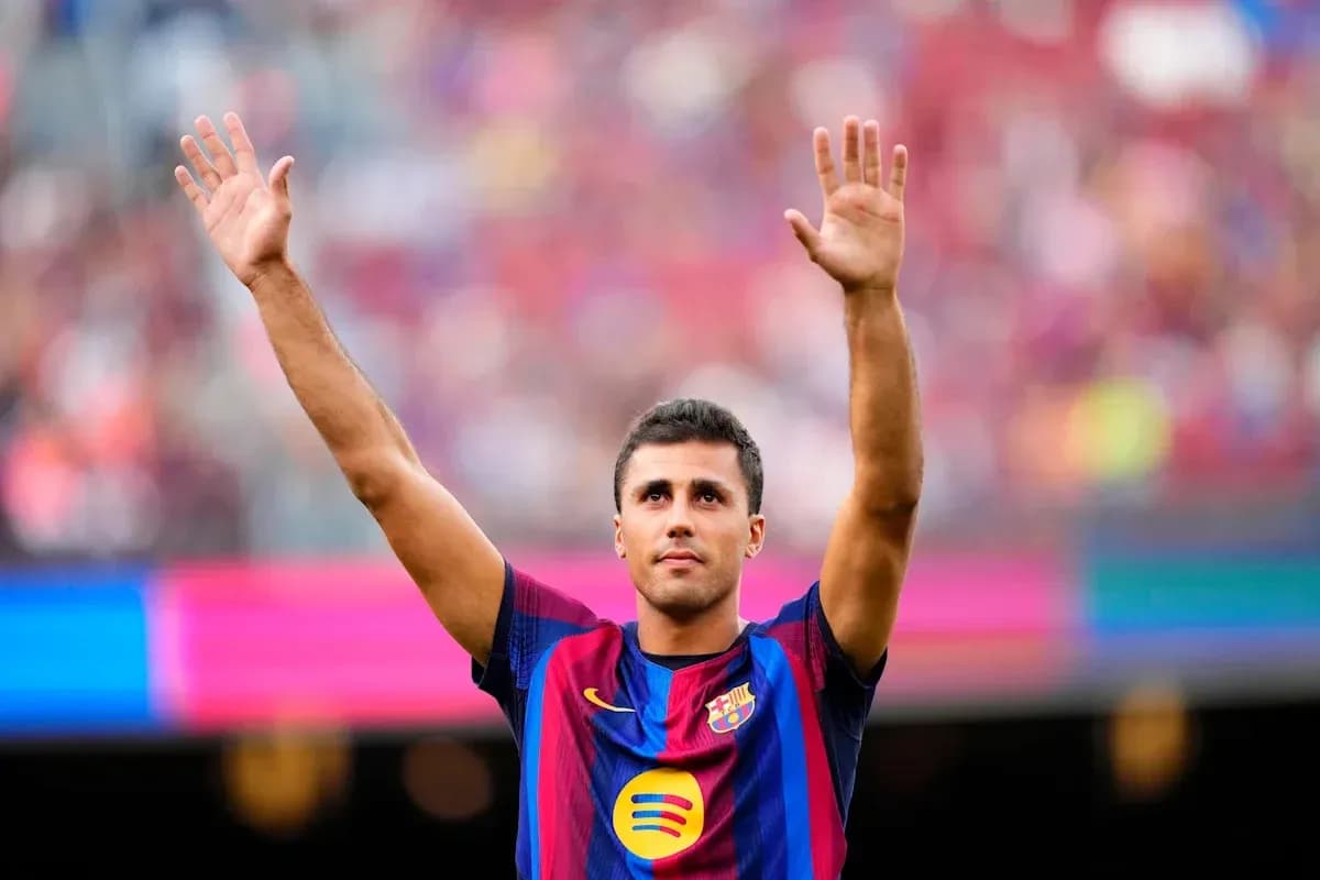 Player waving to fans during match at Camp Nou Player waving to fans during match at Camp Nou