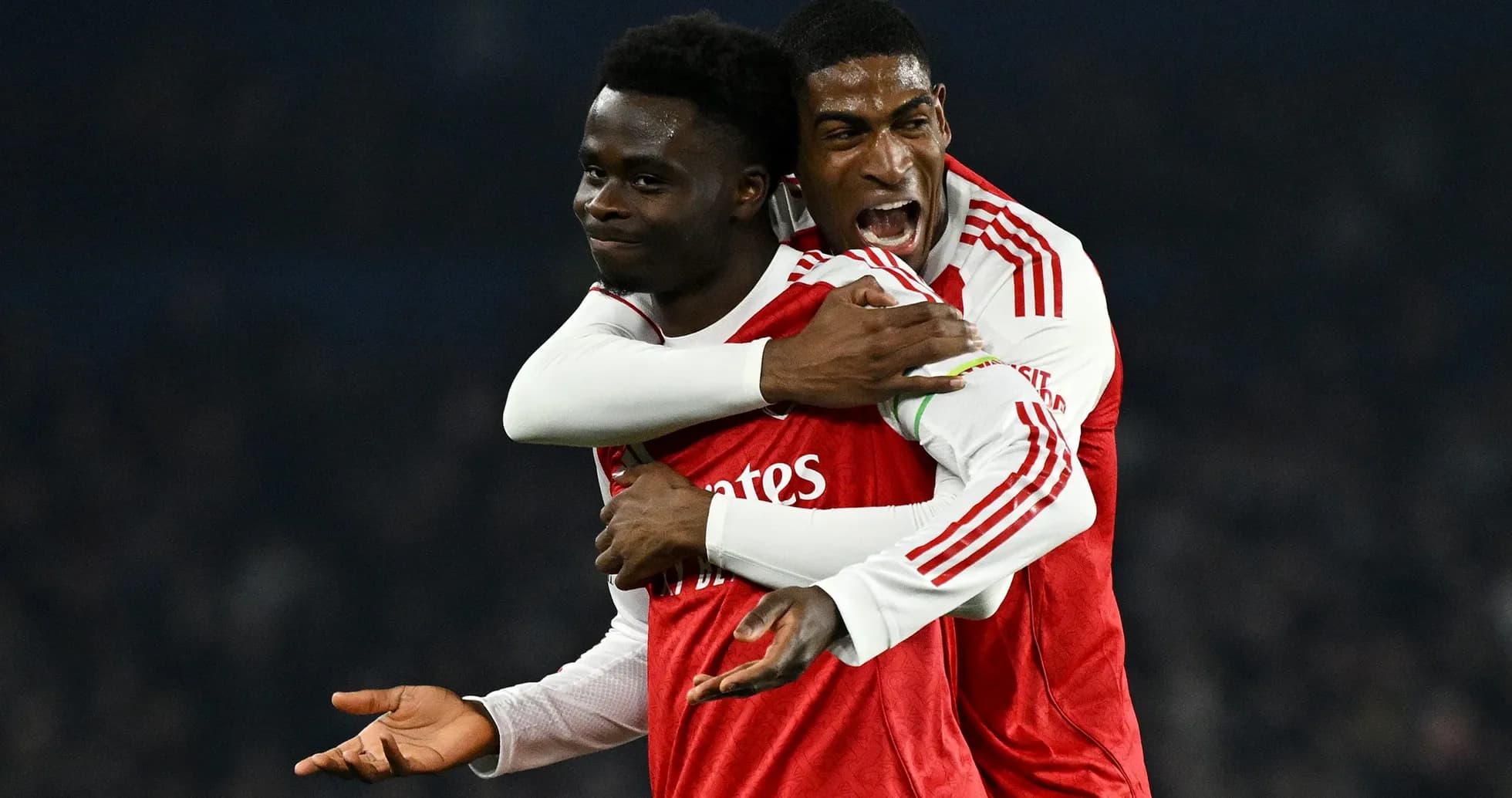 Arsenal players celebrating during a match Arsenal players celebrating during a match