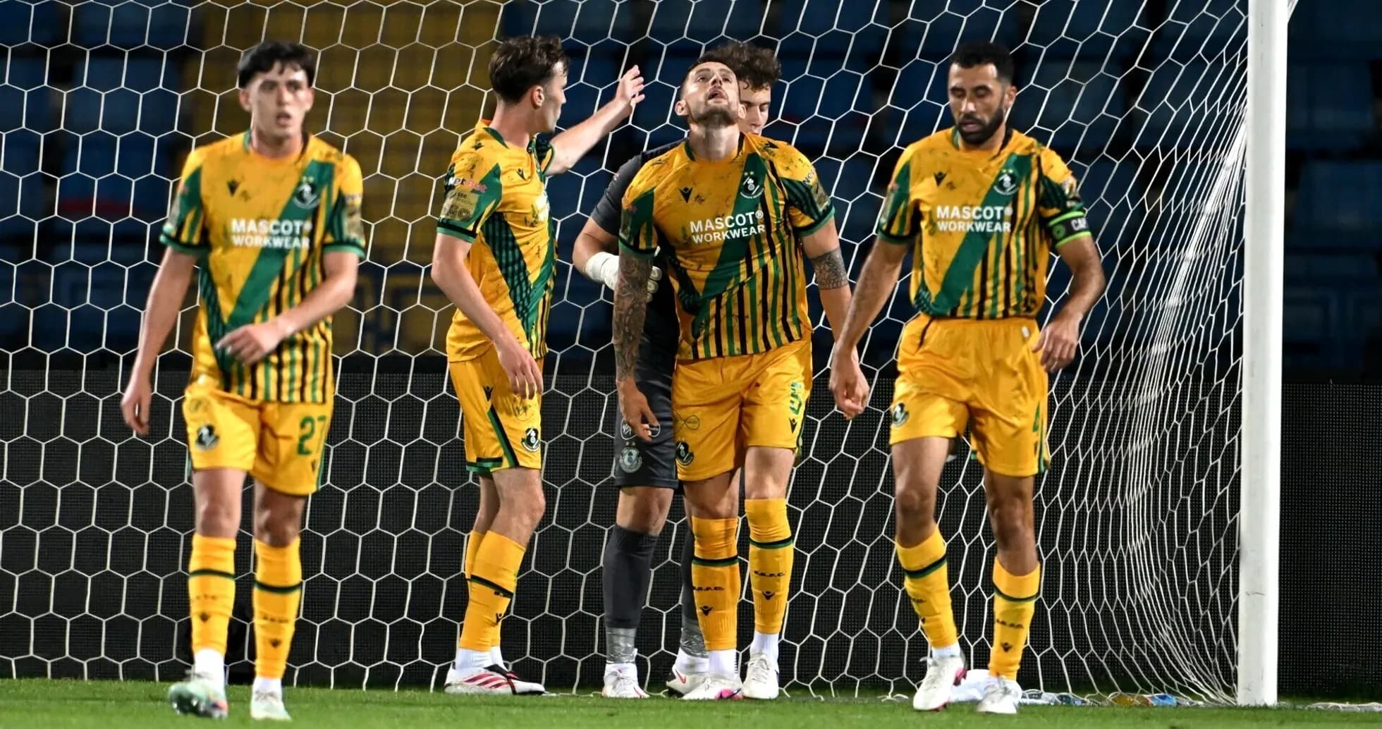 Shamrock Rovers players celebrating a goal Shamrock Rovers players celebrating a goal