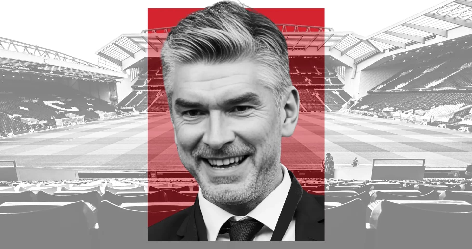Smiling man in suit at football stadium Smiling man in suit at football stadium