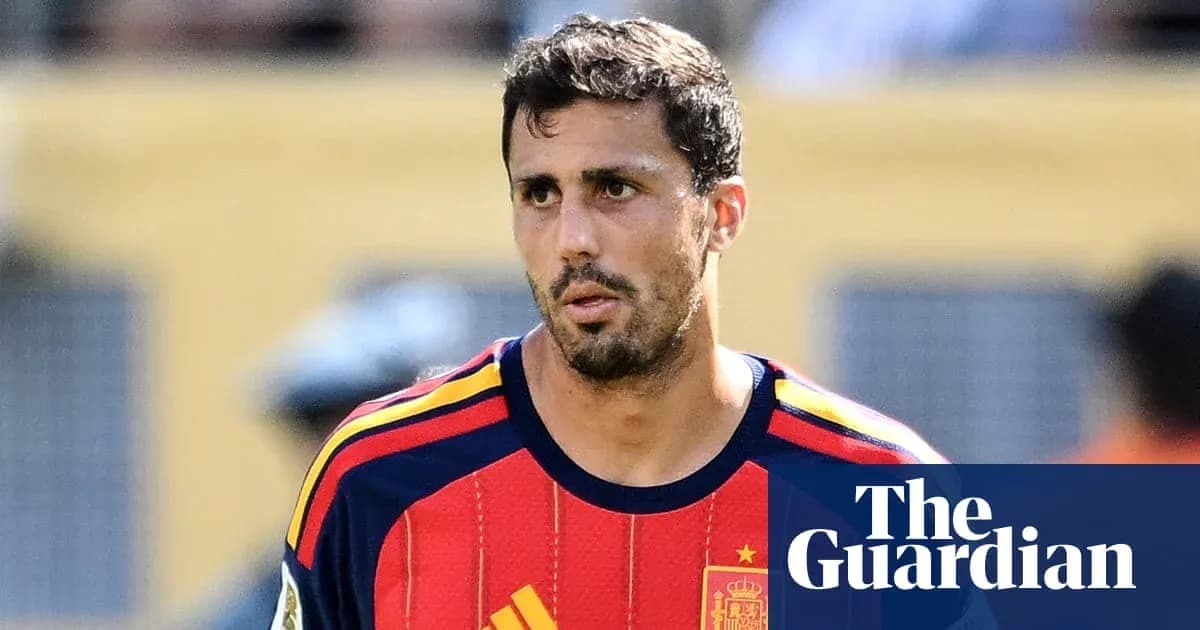 Player in Spain national team jersey on field Player in Spain national team jersey on field