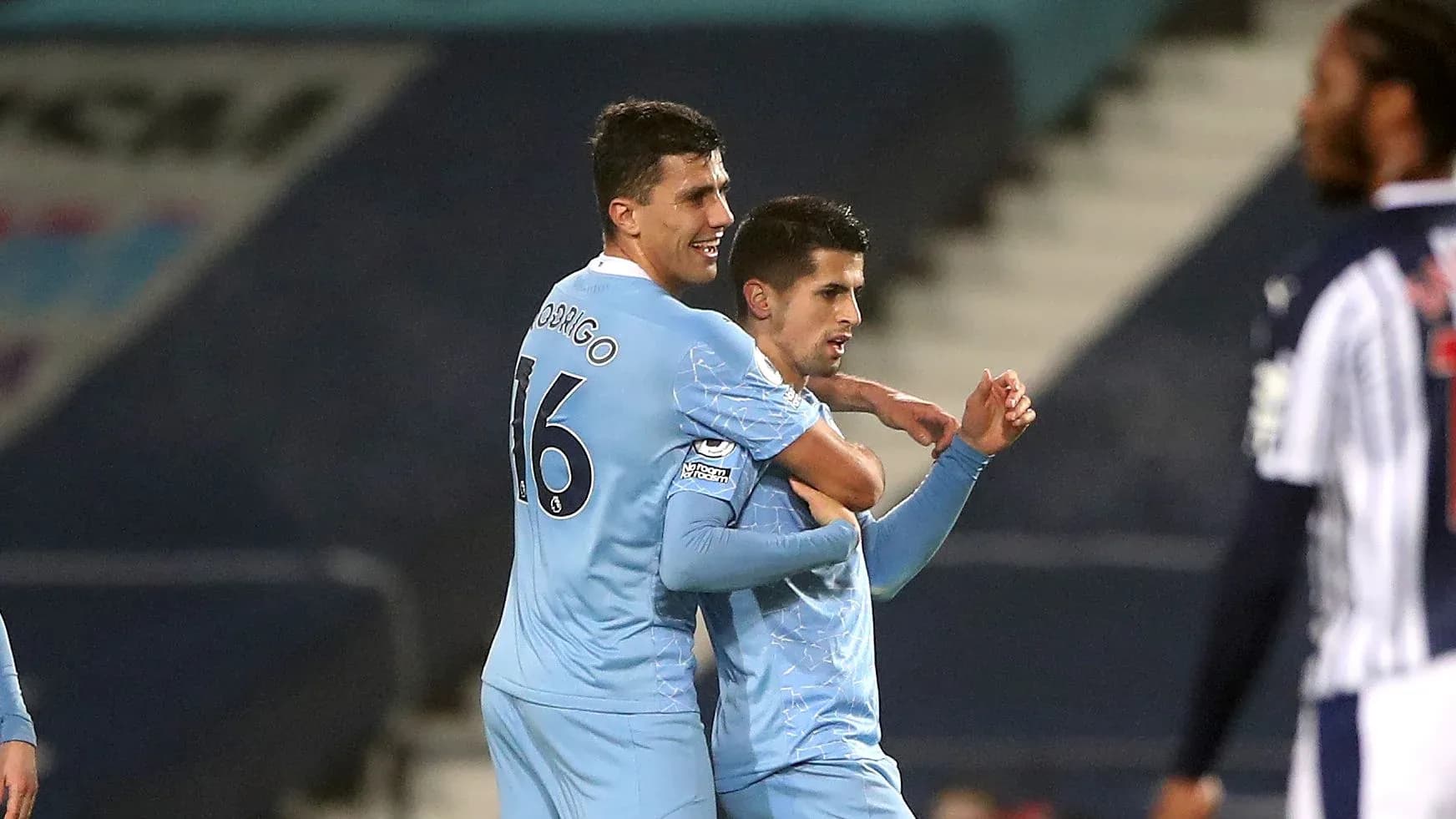 Players celebrating a goal during a match Players celebrating a goal during a match