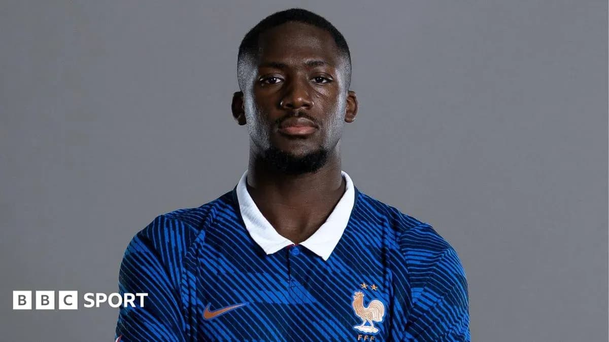 Player in France national team jersey posing for portrait Player in France national team jersey posing for portrait