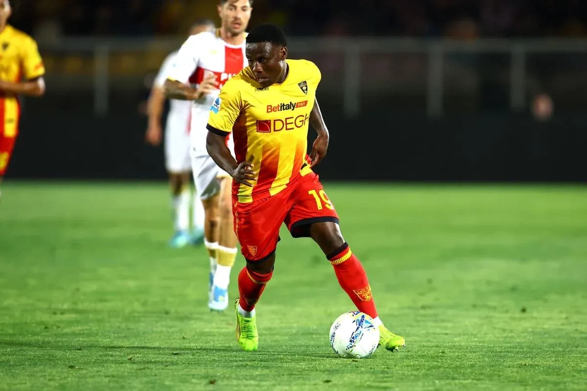 Lecce player dribbling the ball during match Lecce player dribbling the ball during match