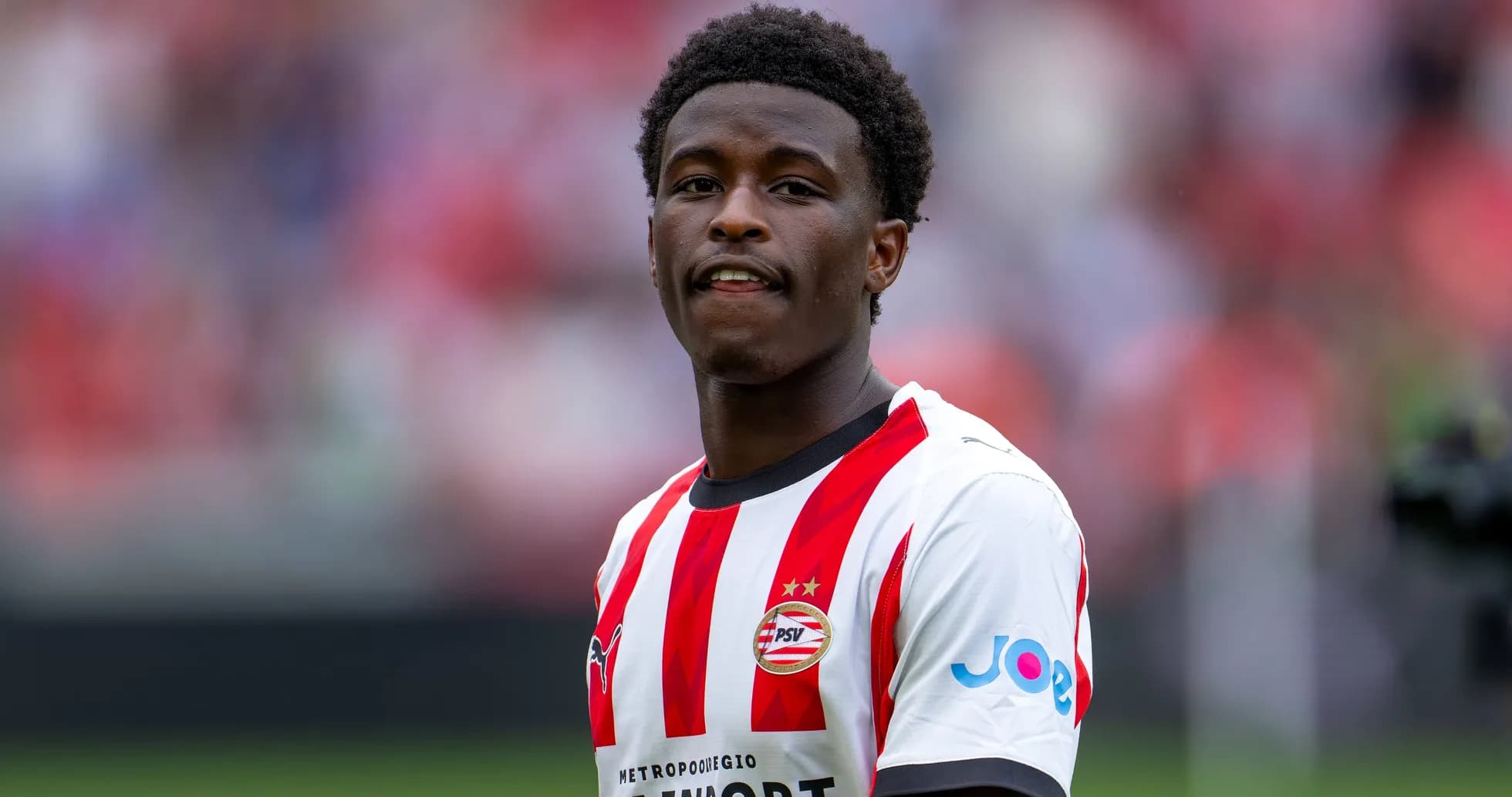 Player in PSV jersey during match warm-up Player in PSV jersey during match warm-up