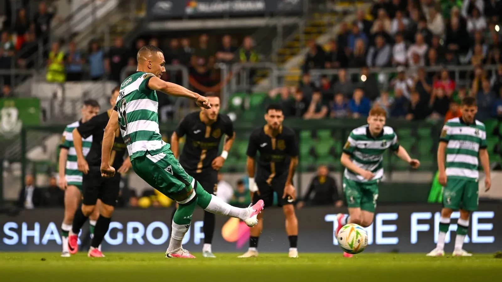Player taking a penalty kick during match Player taking a penalty kick during match