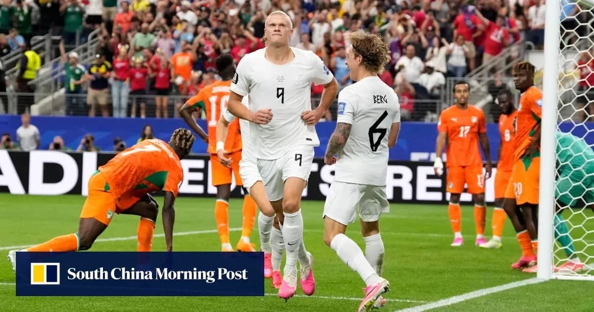 Player celebrating goal with teammates during match Player celebrating goal with teammates during match