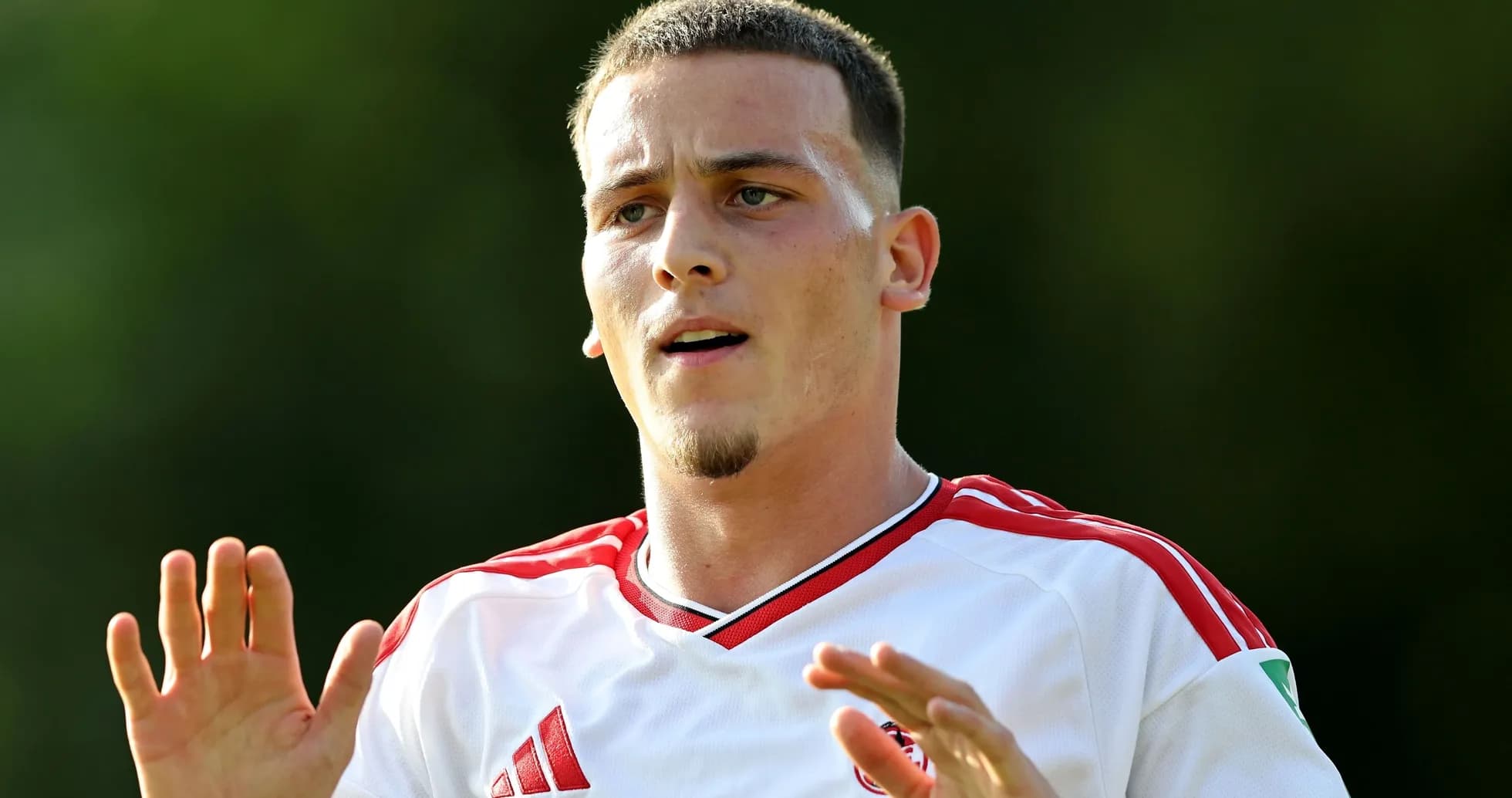 Player gesturing during a training session Player gesturing during a training session