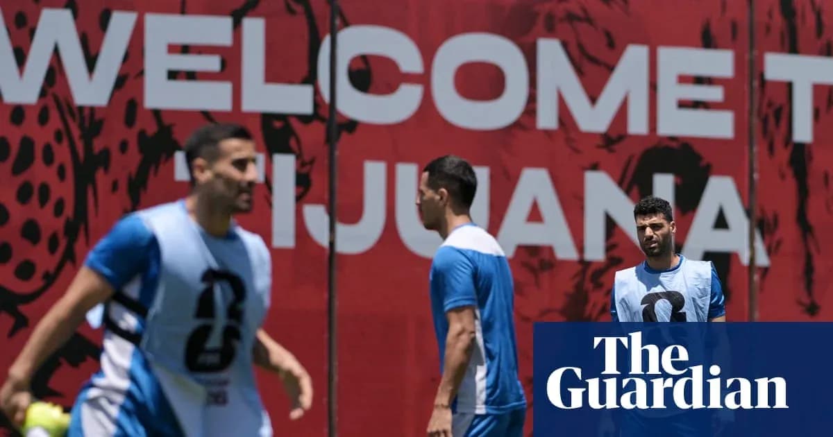 Players training near a welcome sign in Tijuana Players training near a welcome sign in Tijuana