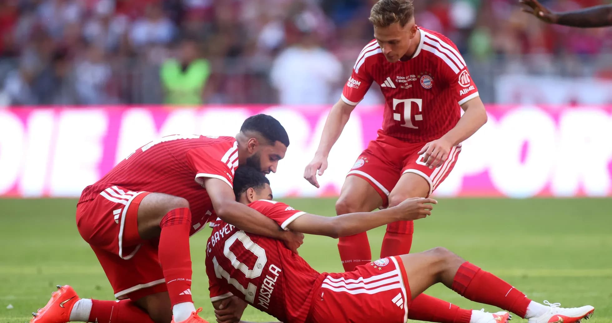 Bayern Munich players celebrating after a goal Bayern Munich players celebrating after a goal
