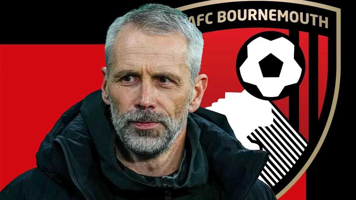 AFC Bournemouth manager with team logo background AFC Bournemouth manager with team logo background
