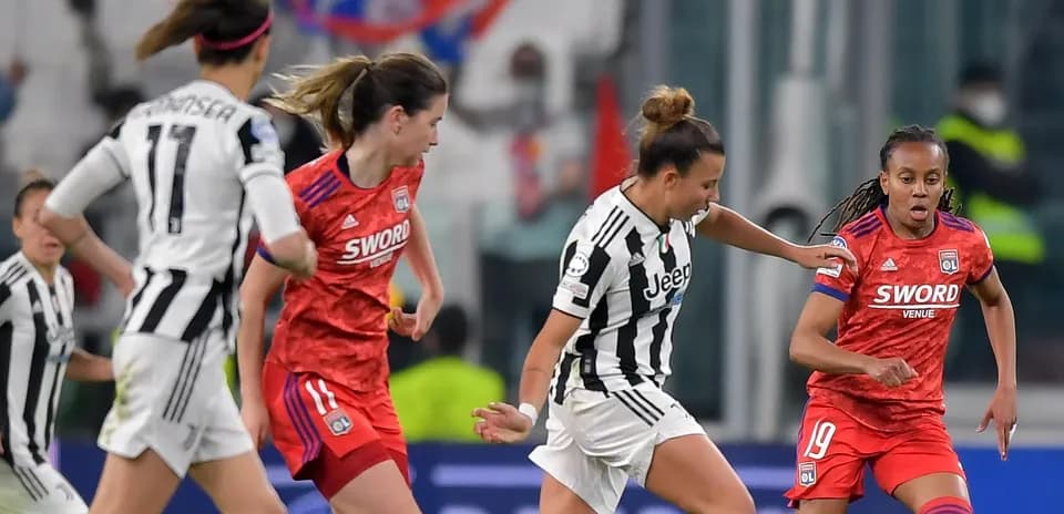 Juventus and Lyon women players in action Juventus and Lyon women players in action