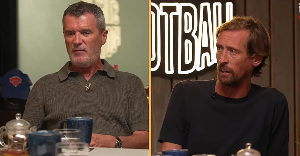 Two men discussing football at a table Two men discussing football at a table