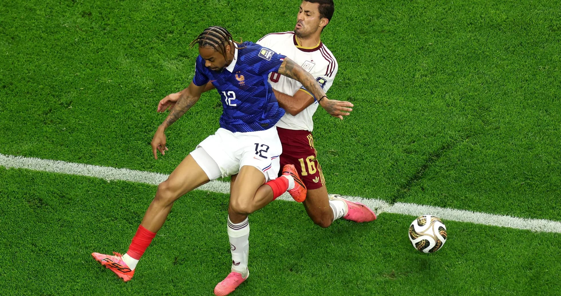 Players battling for the ball during a match Players battling for the ball during a match