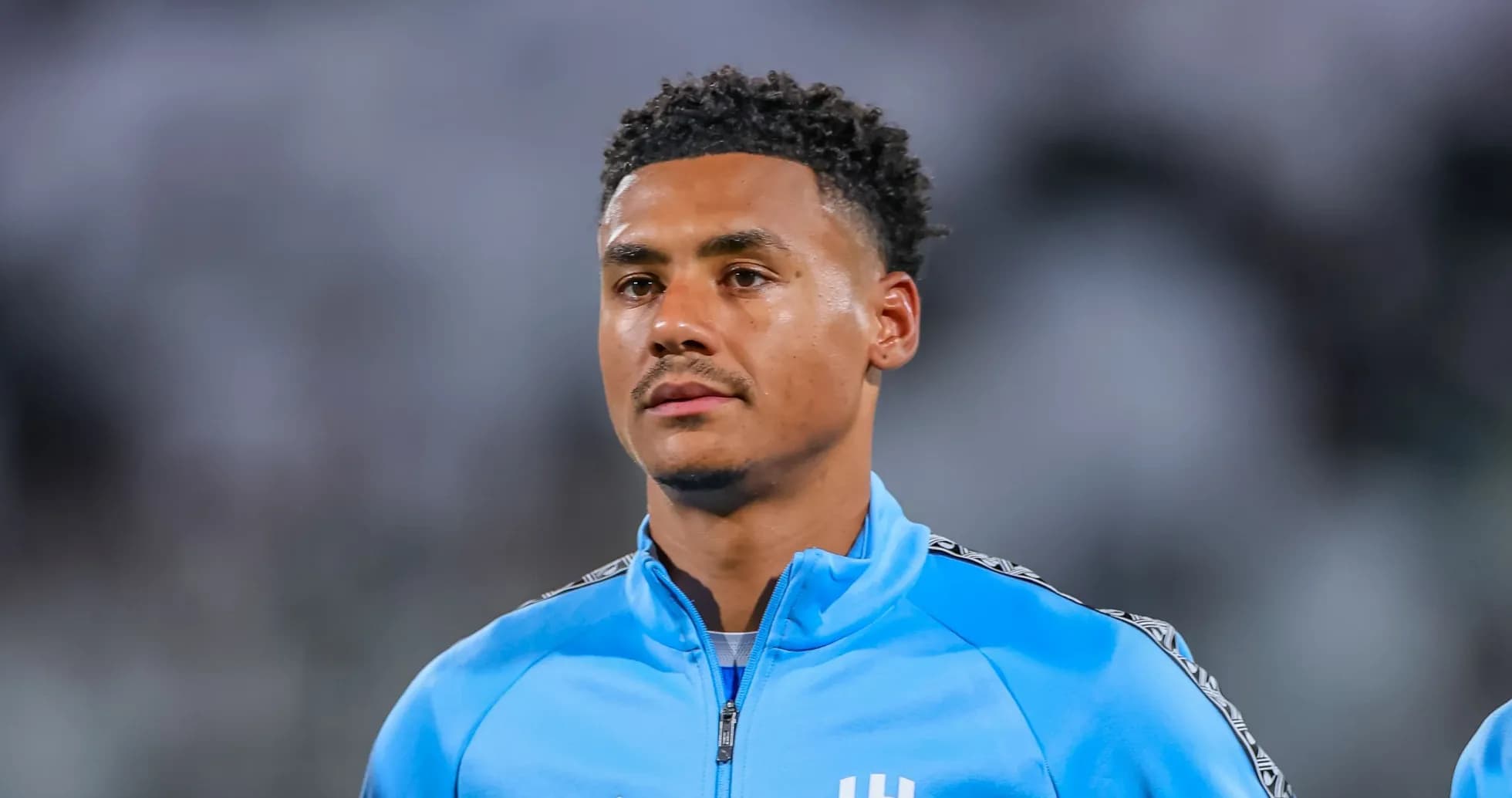 Player in blue training kit before match Player in blue training kit before match