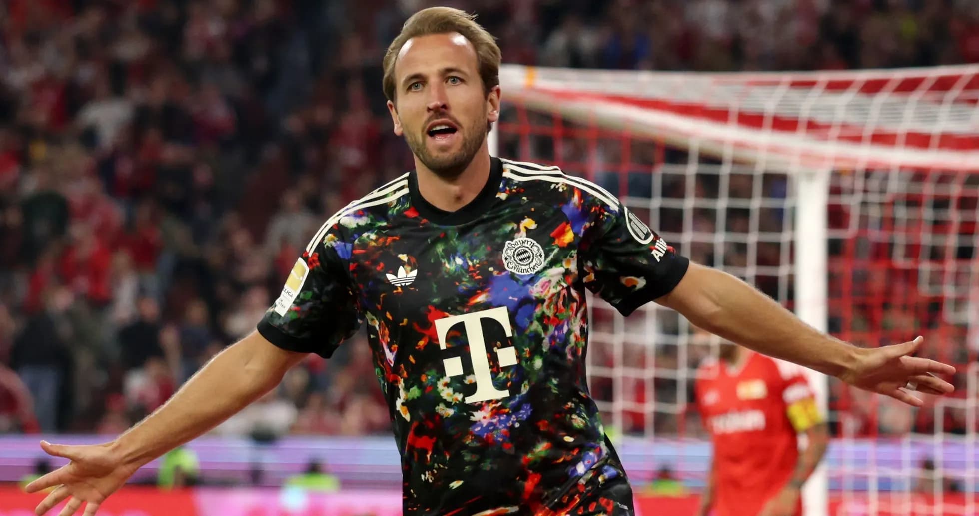 Player celebrating goal in colorful jersey Player celebrating goal in colorful jersey