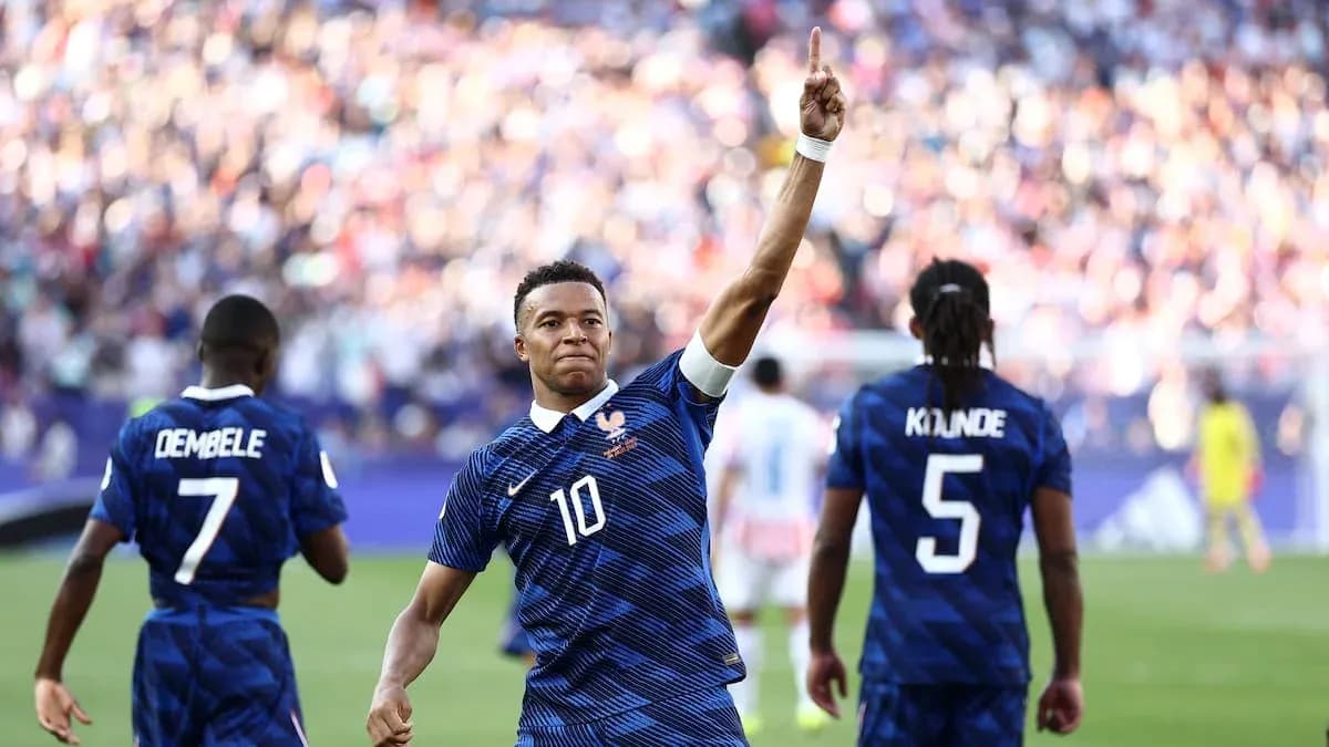 Kylian Mbappé celebrating a goal with teammates Kylian Mbappé celebrating a goal with teammates