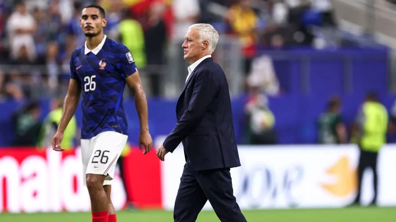 France coach walking past player after match France coach walking past player after match