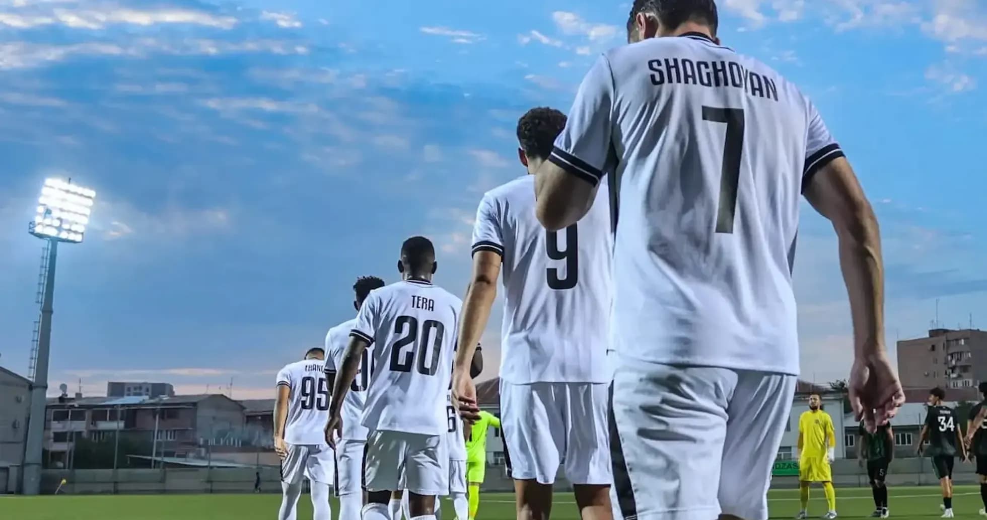 Players walking onto the field for match Players walking onto the field for match