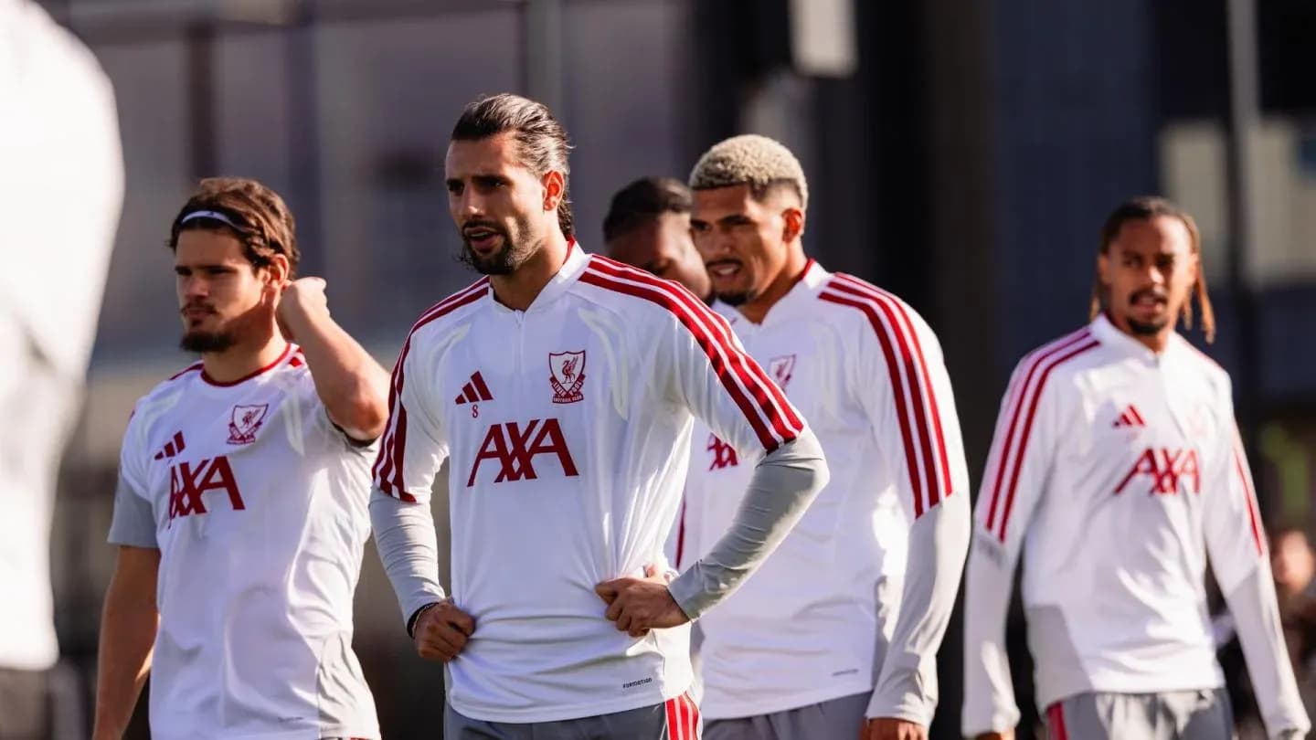 Players training together in Liverpool training kits Players training together in Liverpool training kits