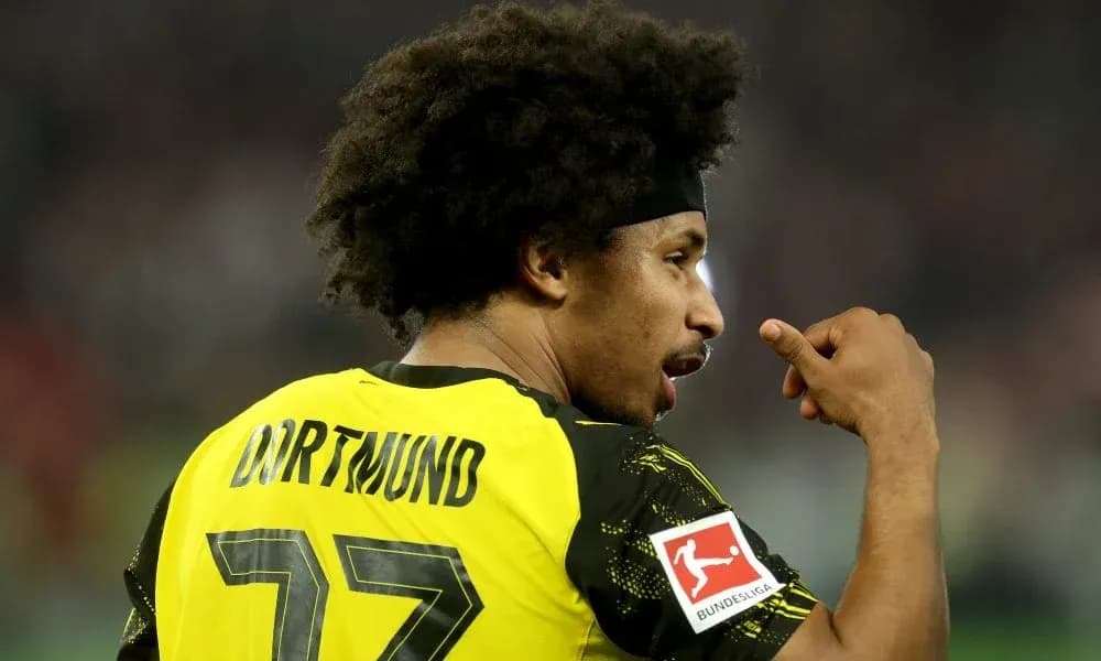 Player in Dortmund jersey gesturing during match Player in Dortmund jersey gesturing during match