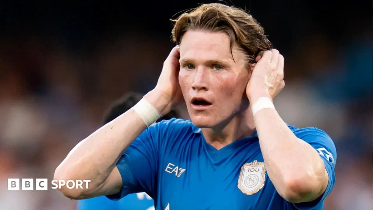 Player in blue jersey holding head during match Player in blue jersey holding head during match