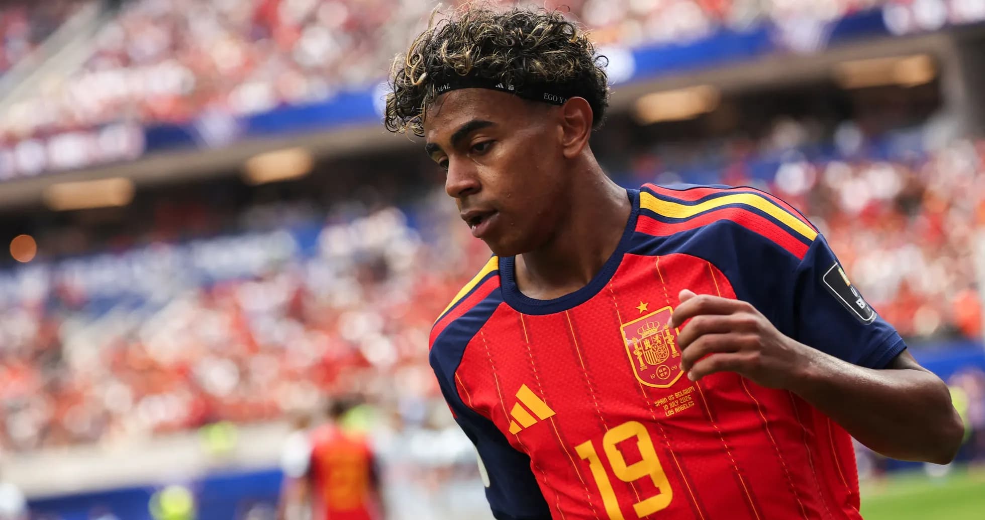 Player wearing Spain jersey during a match Player wearing Spain jersey during a match