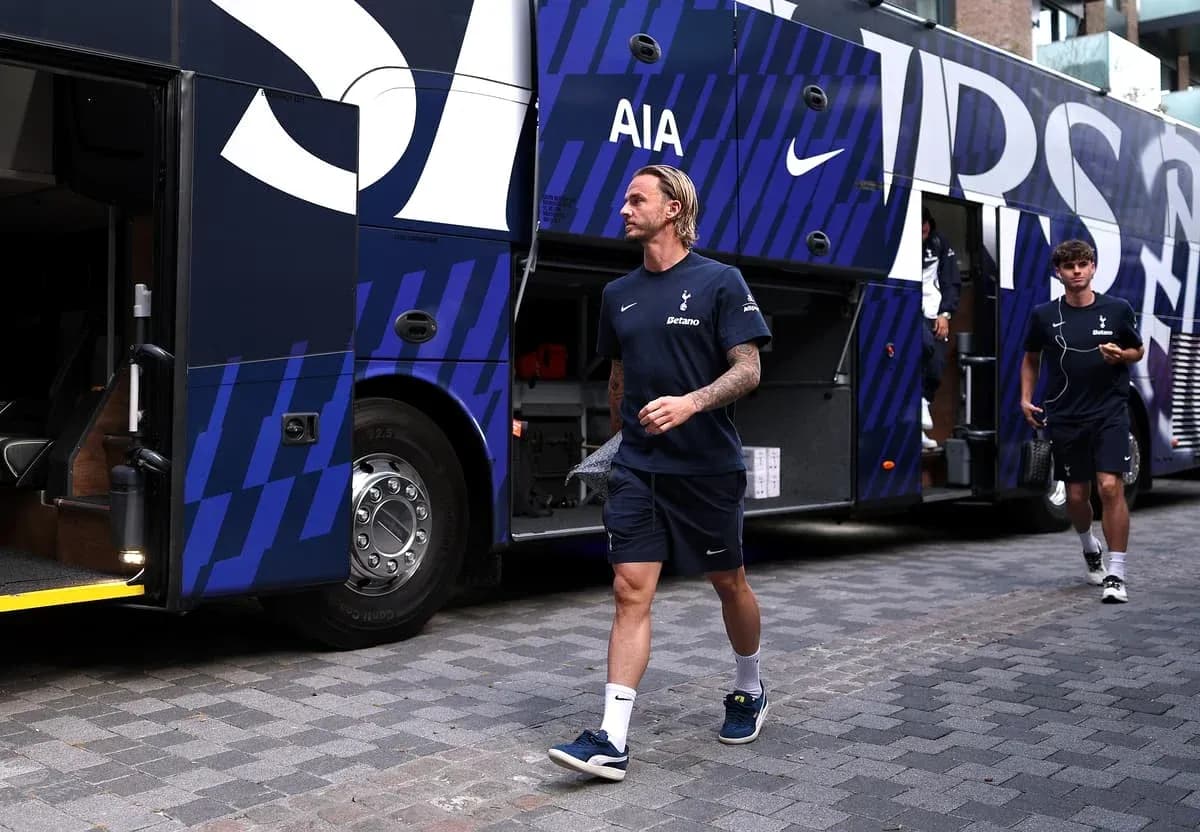 Tottenham players arriving at team bus before match Tottenham players arriving at team bus before match