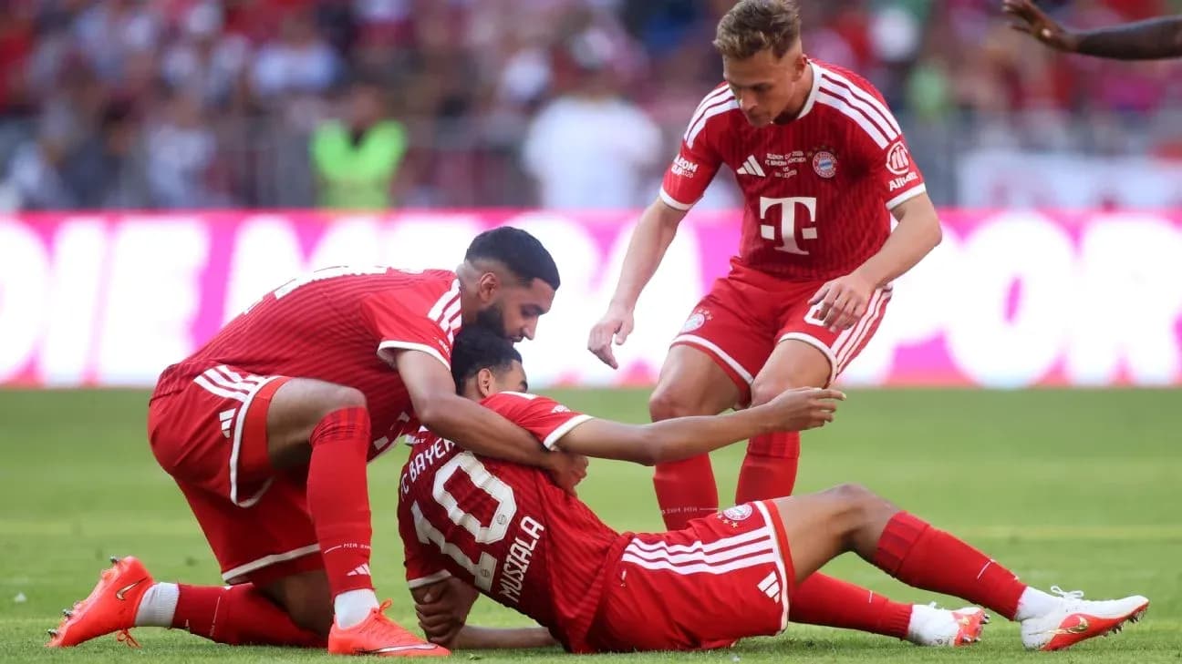 Bayern Munich players celebrating a goal on field Bayern Munich players celebrating a goal on field