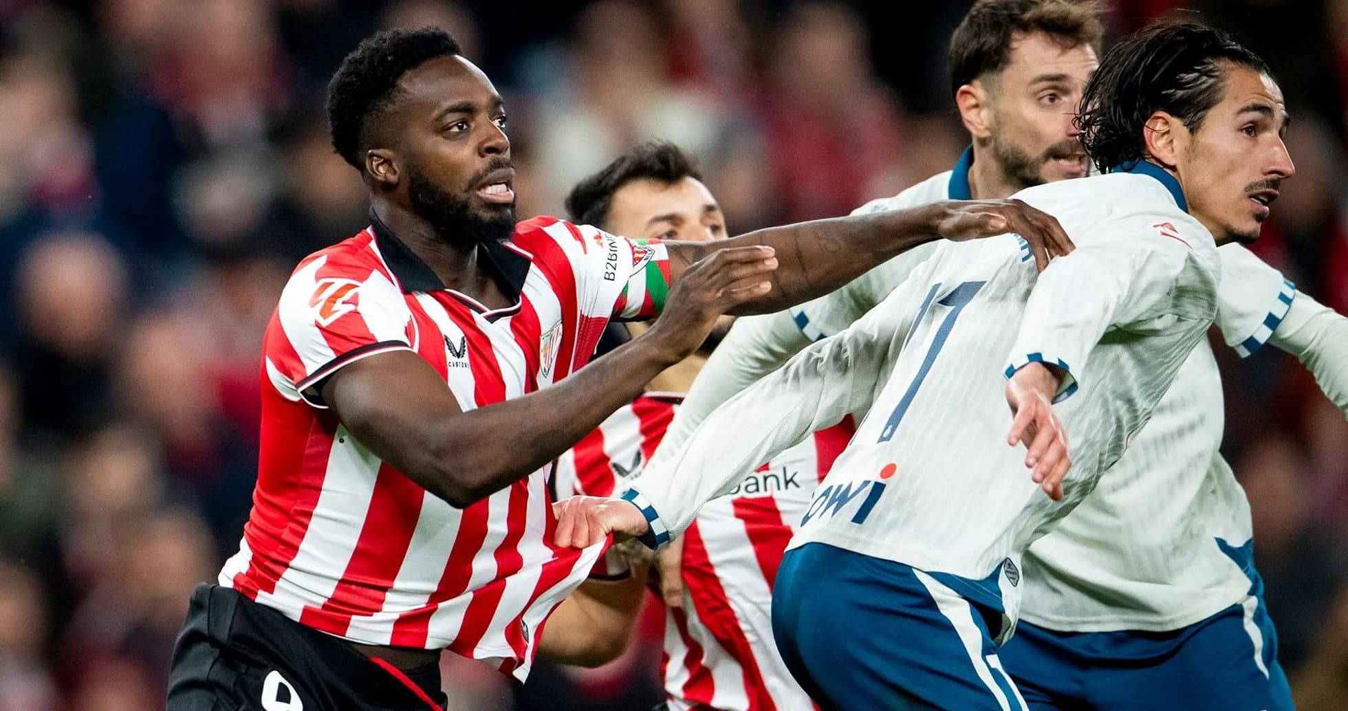 Athletic Club players competing for the ball Athletic Club players competing for the ball
