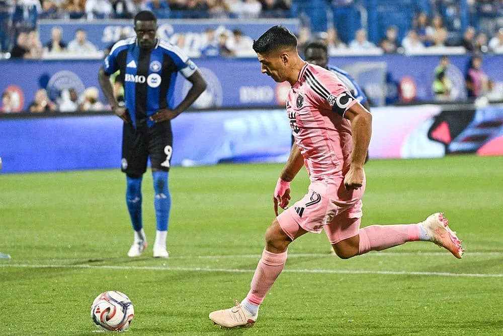 Inter Miami player taking a penalty kick Inter Miami player taking a penalty kick