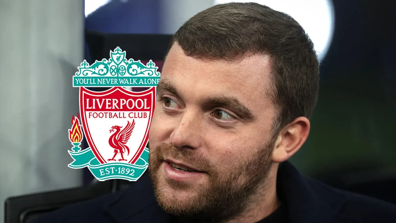 Close-up of a man with Liverpool FC logo Close-up of a man with Liverpool FC logo
