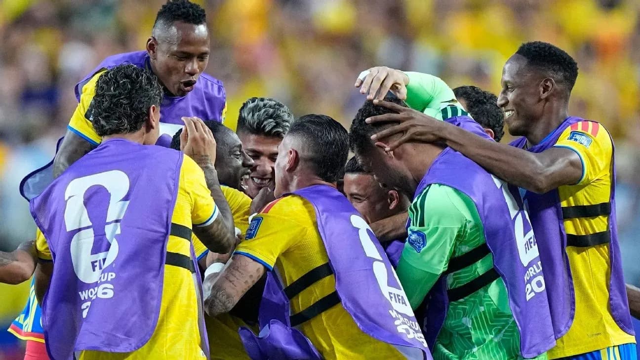 Players celebrating together after a goal scored Players celebrating together after a goal scored