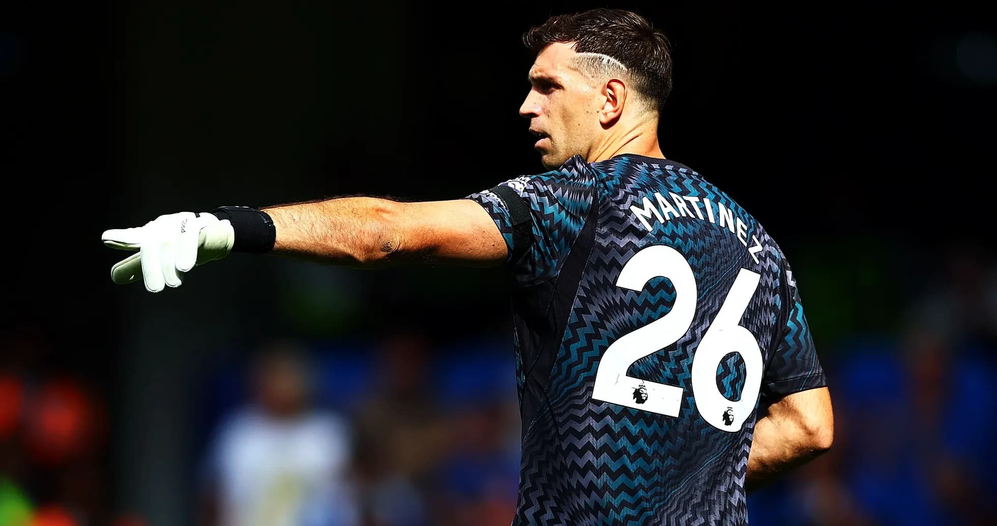 Goalkeeper Emiliano Martinez directing play on field Goalkeeper Emiliano Martinez directing play on field
