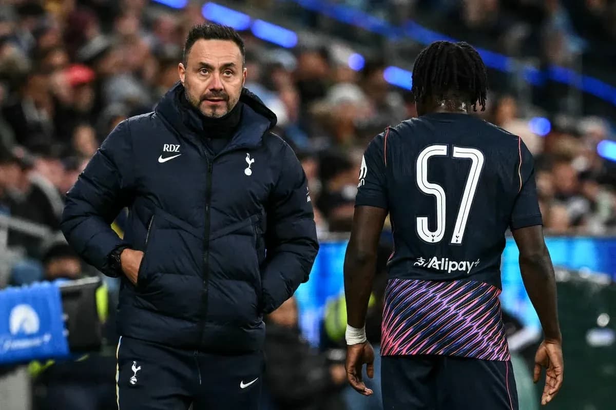 Coach speaking to player during match on sidelines Coach speaking to player during match on sidelines
