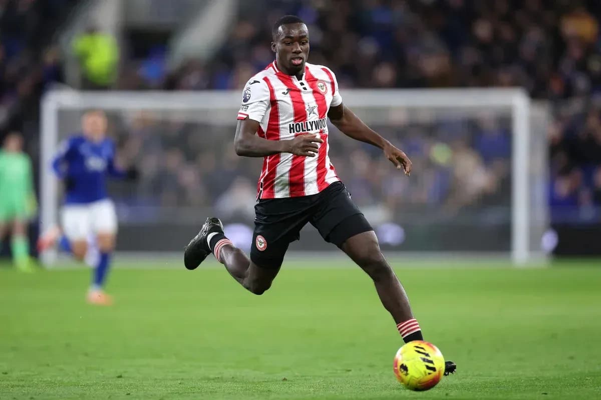 Player running with ball during match action Player running with ball during match action