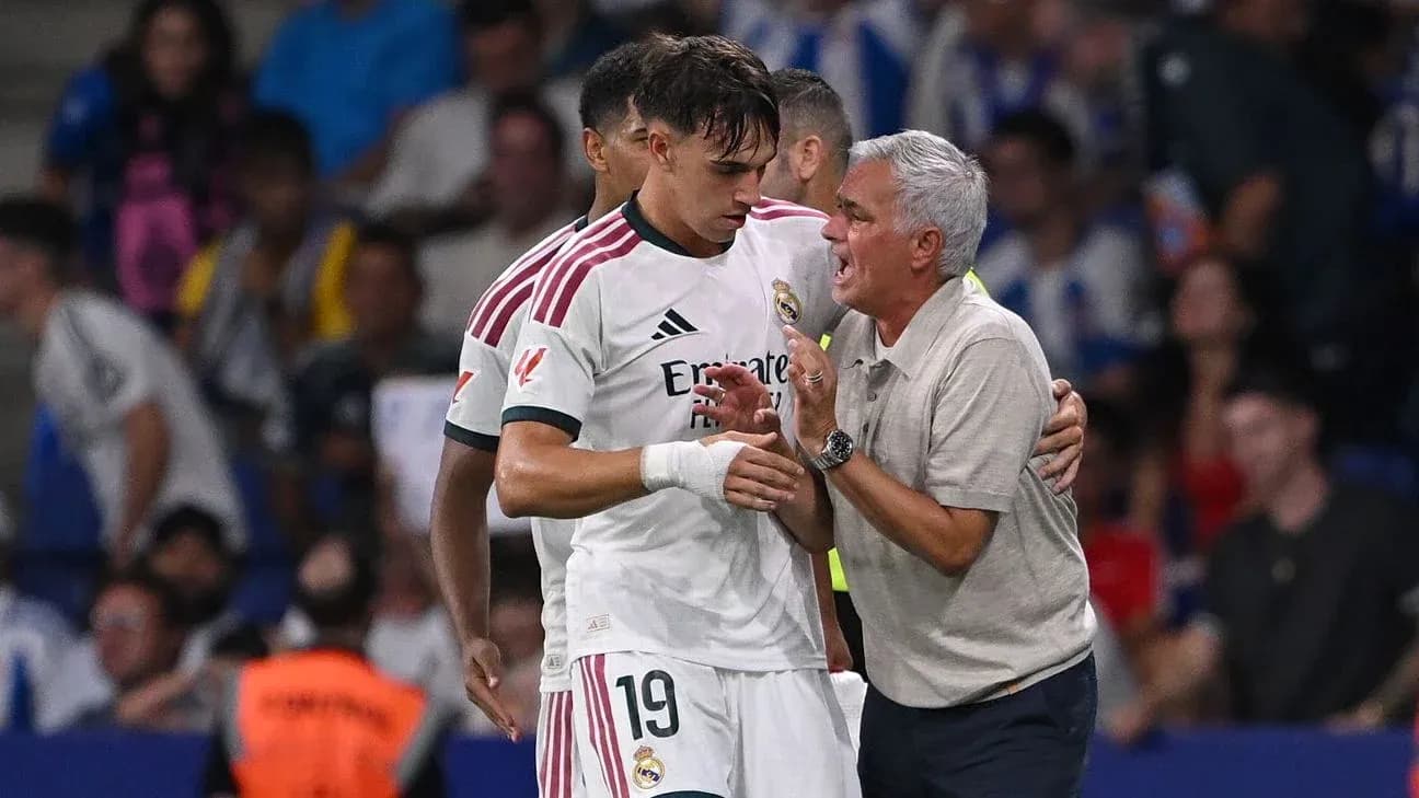 Coach speaking to player during a match Coach speaking to player during a match