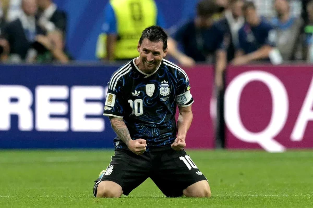 Lionel Messi celebrating on the field for Argentina Lionel Messi celebrating on the field for Argentina