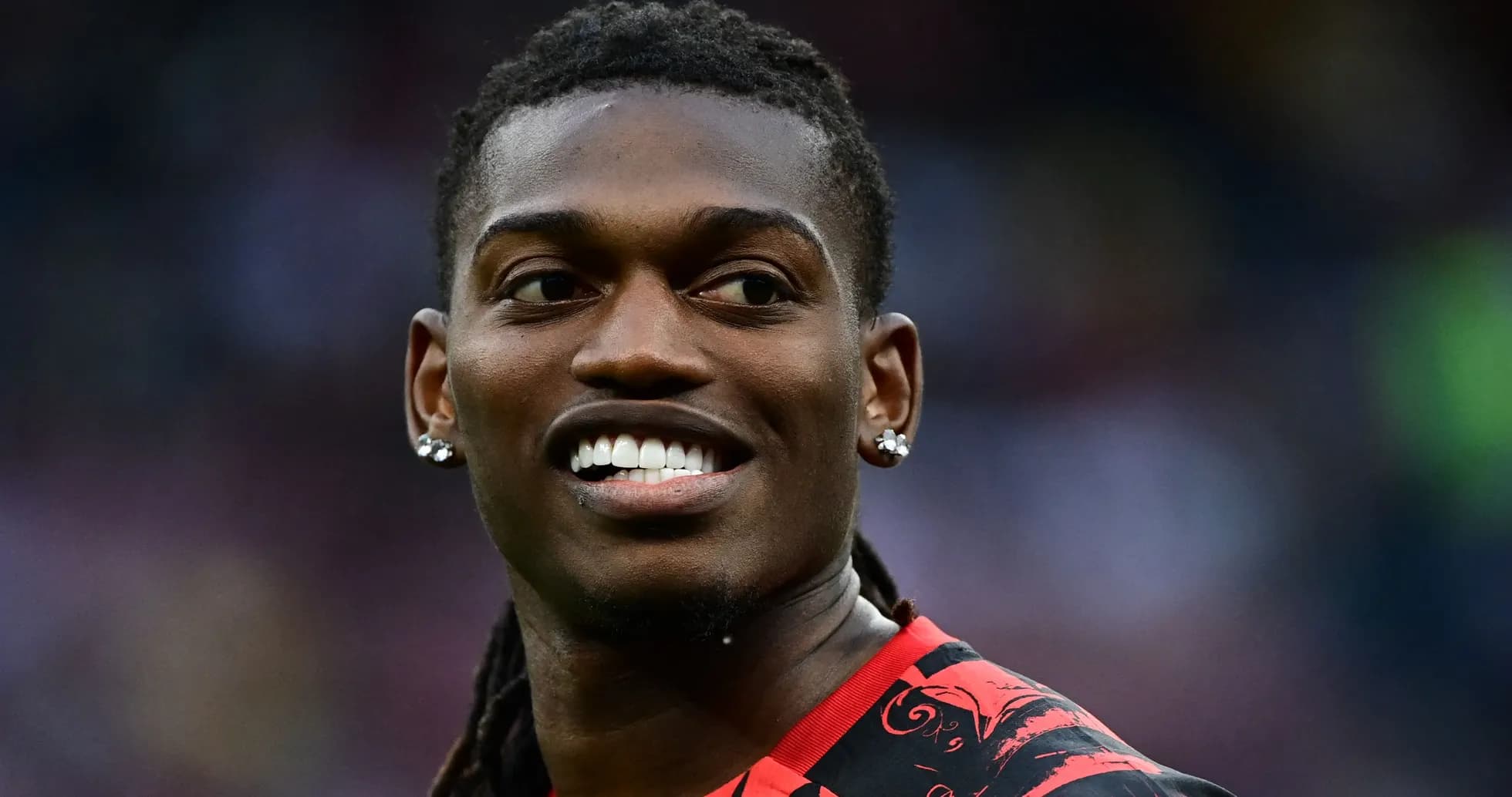 Player smiling during a match warm-up Player smiling during a match warm-up