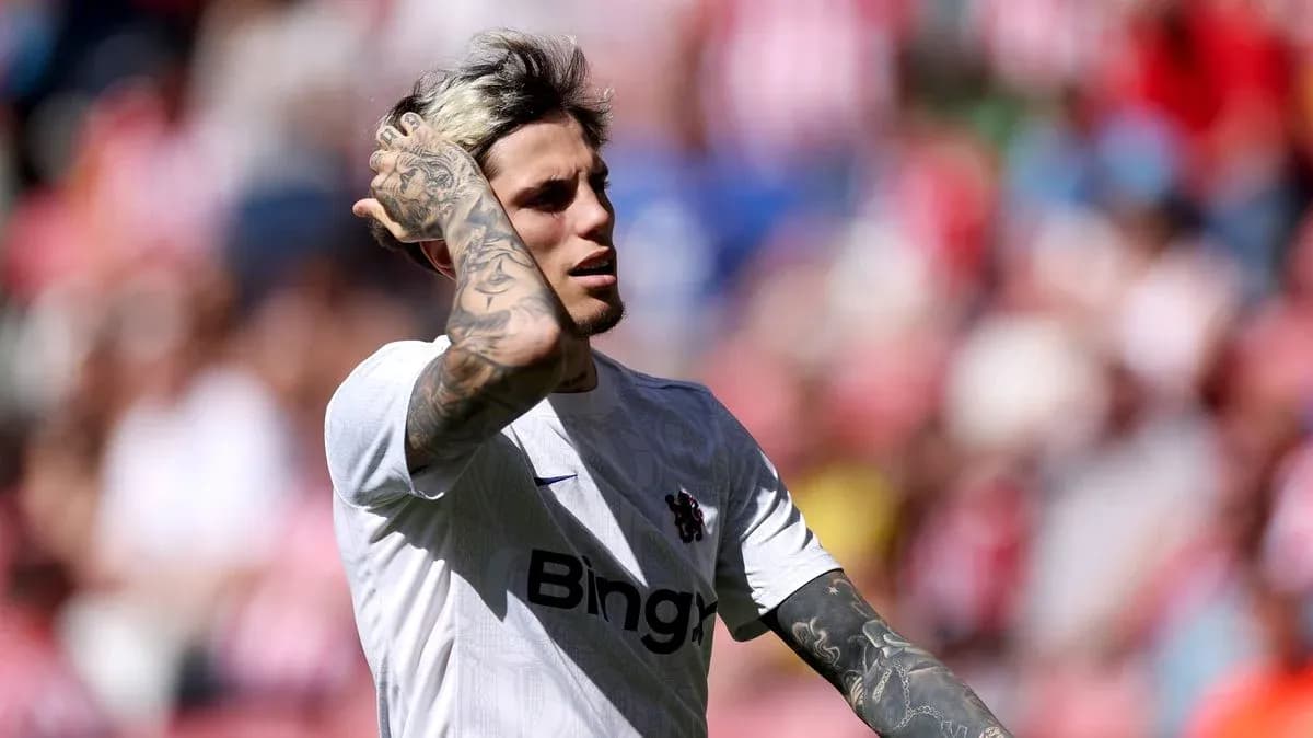 Player with tattoos during a match at stadium Player with tattoos during a match at stadium