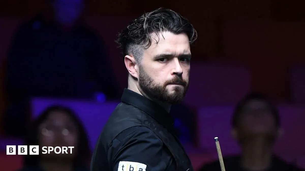 Snooker player preparing for a shot during match Snooker player preparing for a shot during match