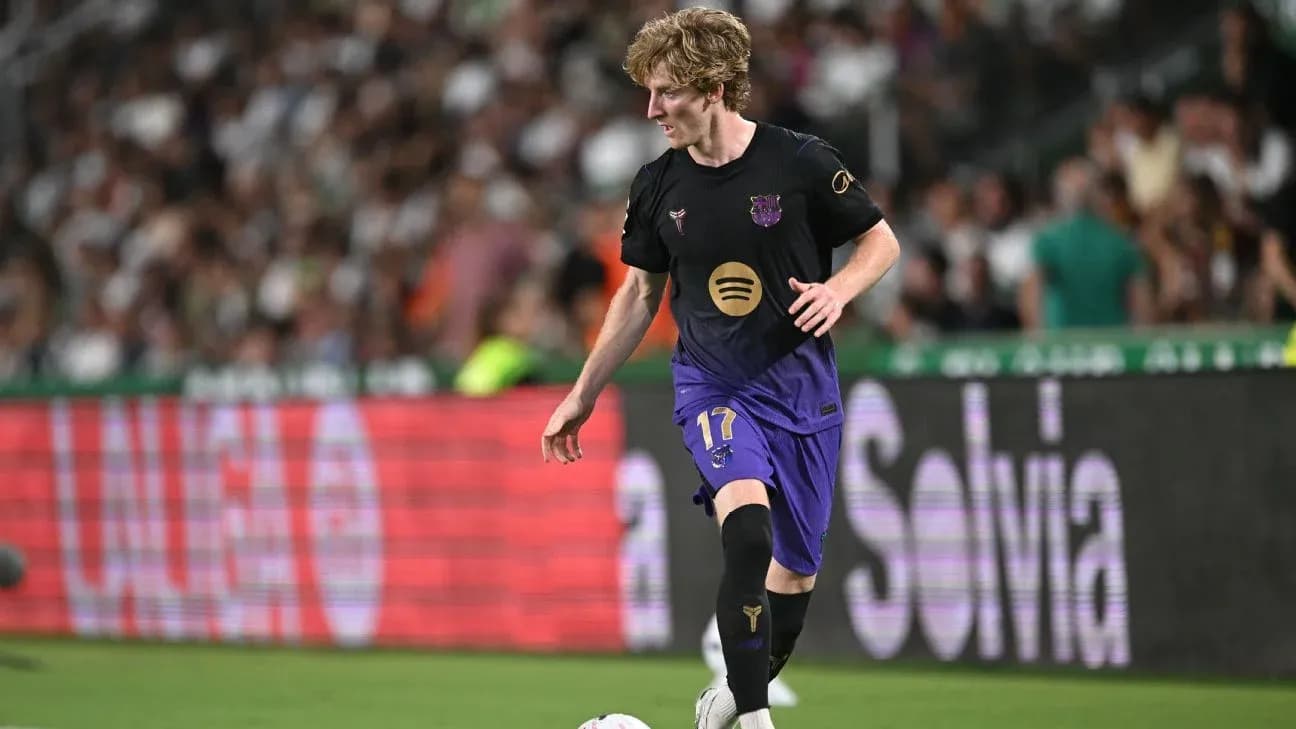 Player dribbling the ball during match action Player dribbling the ball during match action